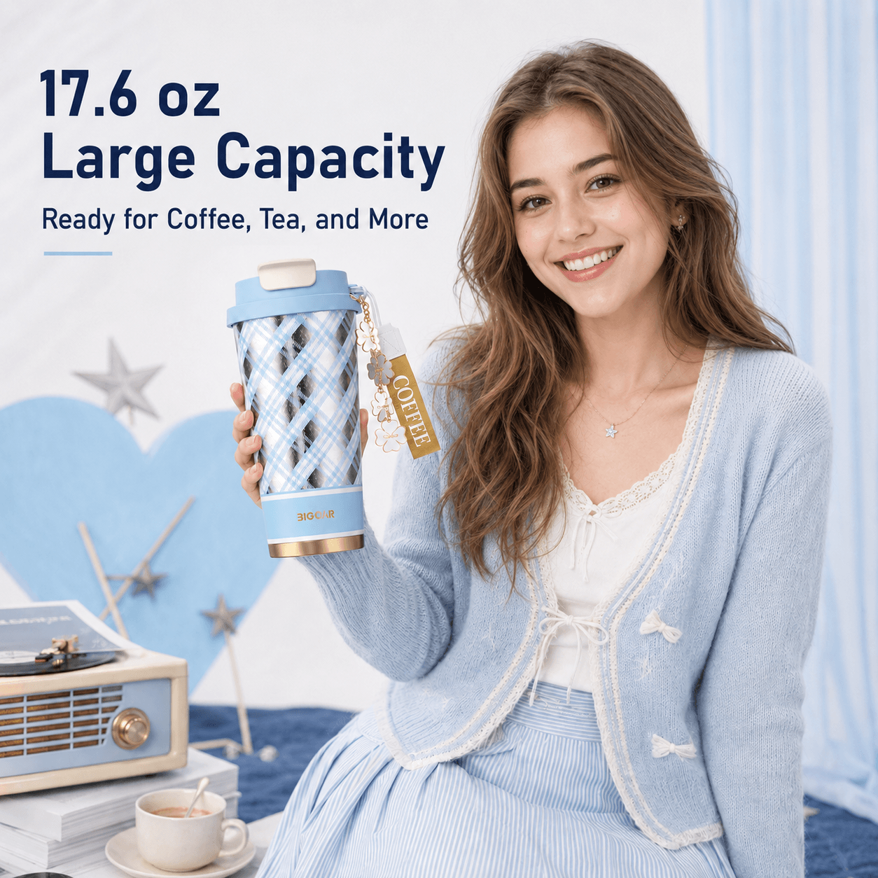Young American woman holding a blue plaid 17.6 oz pure titanium coffee mug