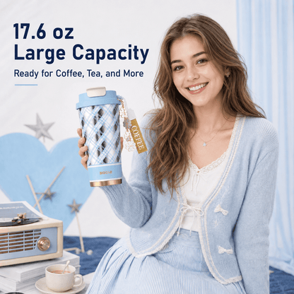 Young American woman holding a blue plaid 17.6 oz pure titanium coffee mug